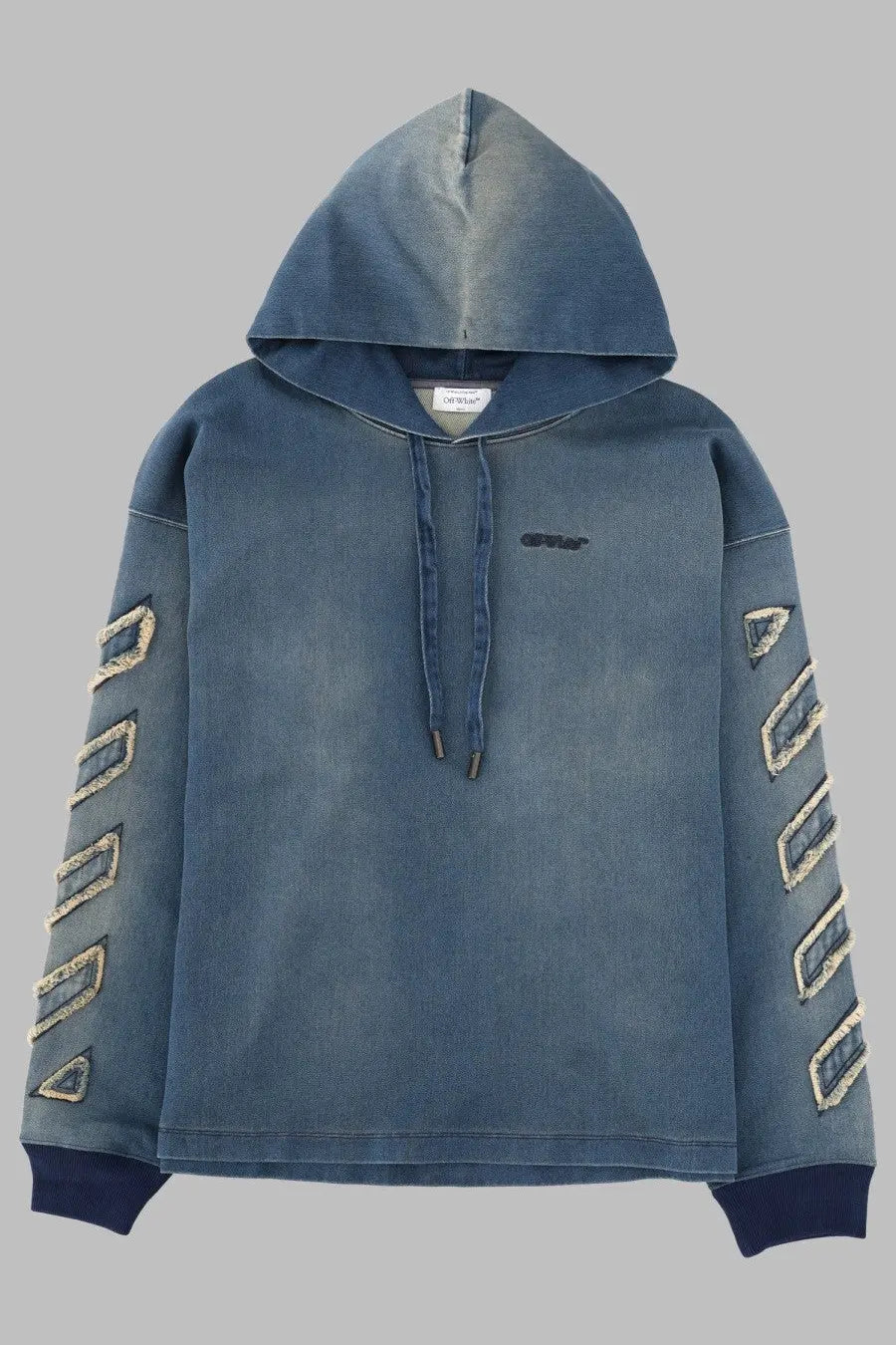 Off-white men’s denim hoodie in blue with distressed texture dark blue cuffs and embroidered geometric sleeve patterns