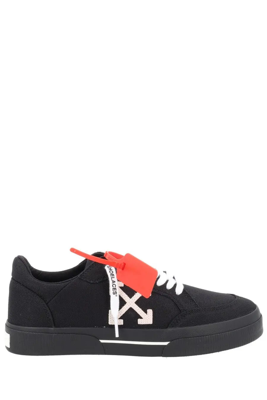 Off-white men’s sneaker vulc low black in black leather with white logo and bright orange tag visible on the side