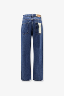 Woodbird men’s Leroy blue denim jeans featuring straight-leg cut and brown leather brand tag at the waistband