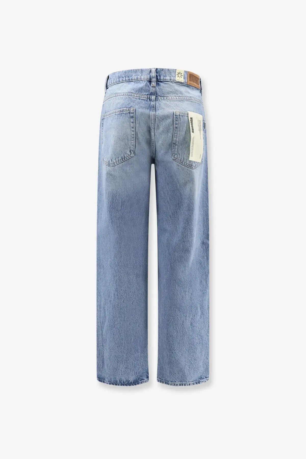 Light-wash woodbird men’s leroy denim jeans blue with wide-leg cut and classic back pockets shown from the back side