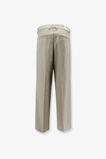 Beige linen Woodbird men’s viscose blend trousers with straight-leg cut and subtle back pleats shown from the back side