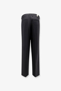 Black tailored woodbird men’s viscose blend trousers with sleek straight-leg cut and subtle back pleats visible in back view