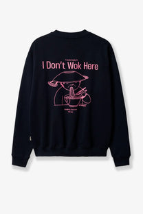 Black crewneck sweatshirt with pink line-art graphic and i dont wok here text on the back organic cotton