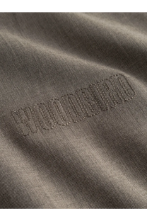 Close-up of dark olive green cotton t-shirt with tonal squad embroidery paired with woodbird men’s wbpon beige jacket in viscose blend