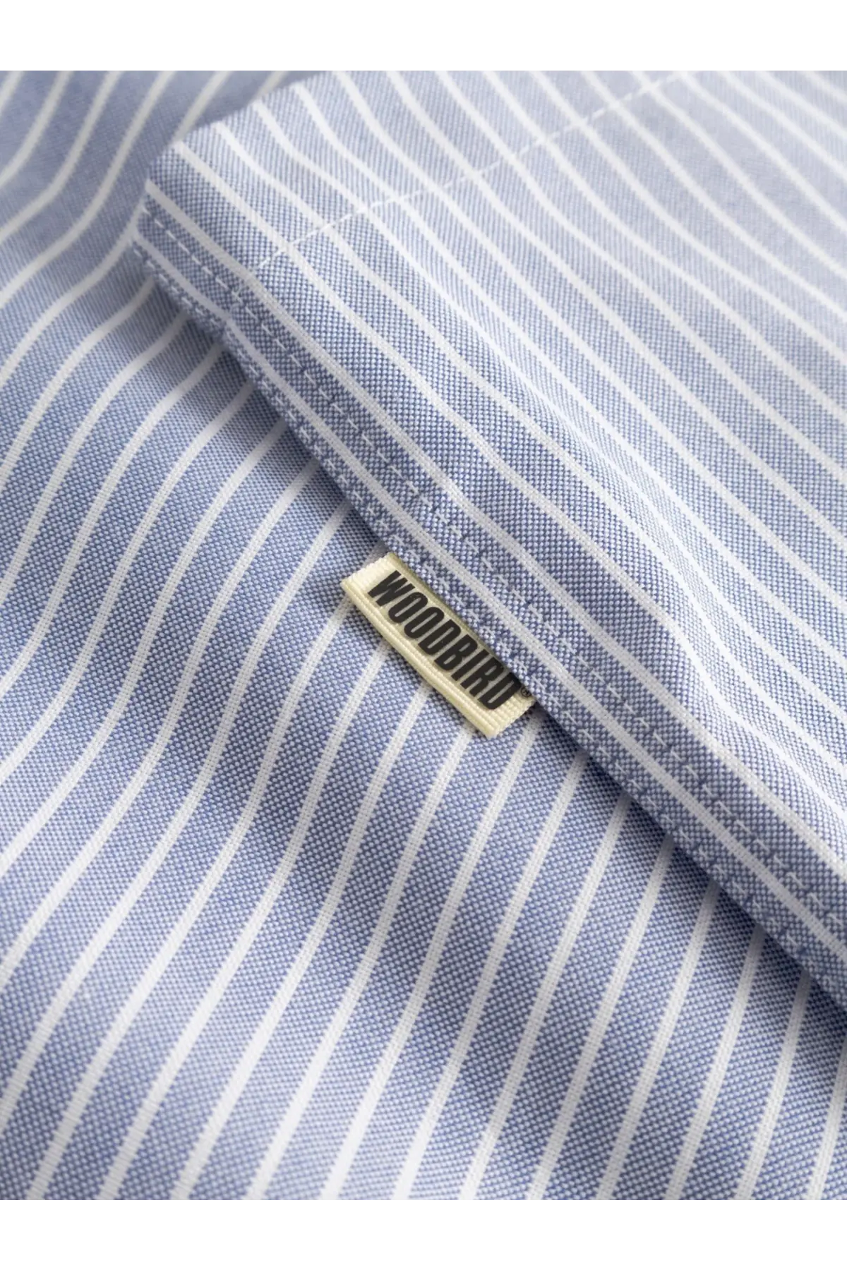 Woodbird men’s wbwang ox flower light blue and white striped cotton shirt with beige brand label in collar