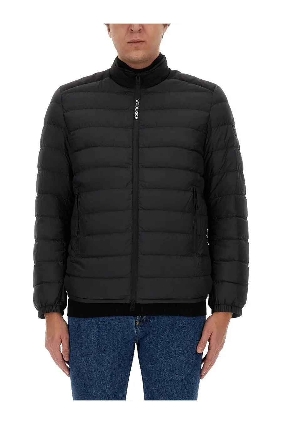 Woolrich men’s black quilted puffer jacket with high collar and zipper closure in warm insulated fabric