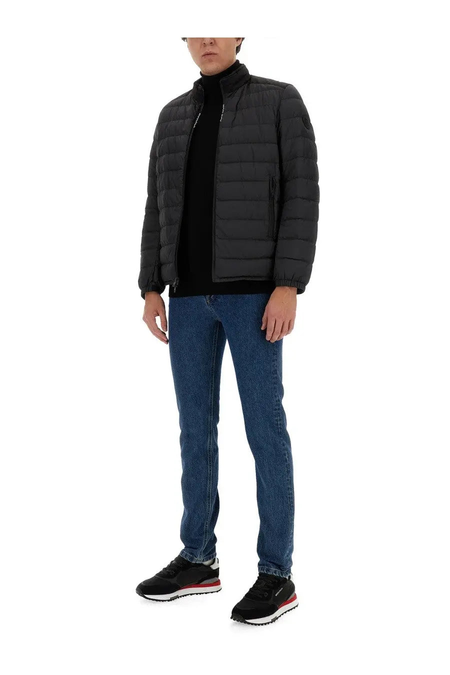Woolrich men’s black quilted puffer jacket with high collar and front zipper made from warm insulated material
