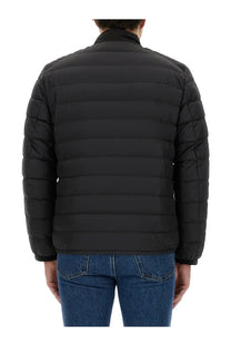 Woolrich men’s black quilted puffer jacket with horizontal stitching and high collar made from durable fabric