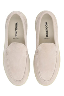 Cream-colored suede Woolrich men’s mocassino loafers with minimalist design and subtle stitching