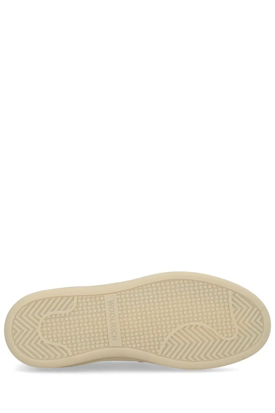 Cream-colored rubber sole with textured herringbone tread and Woodcraft branding on Woolrich men’s suede beige mocassino