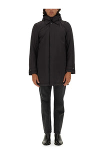 Woolrich men’s black nylon jacket with a sleek minimalist design and subtle button details front view