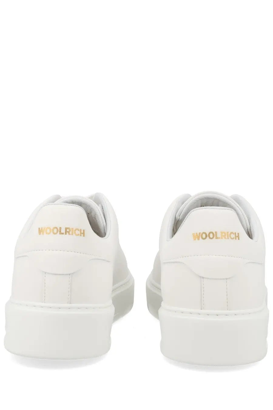 Woolrich men’s sneaker classic court white showing back side with white leather and gold branding on heel