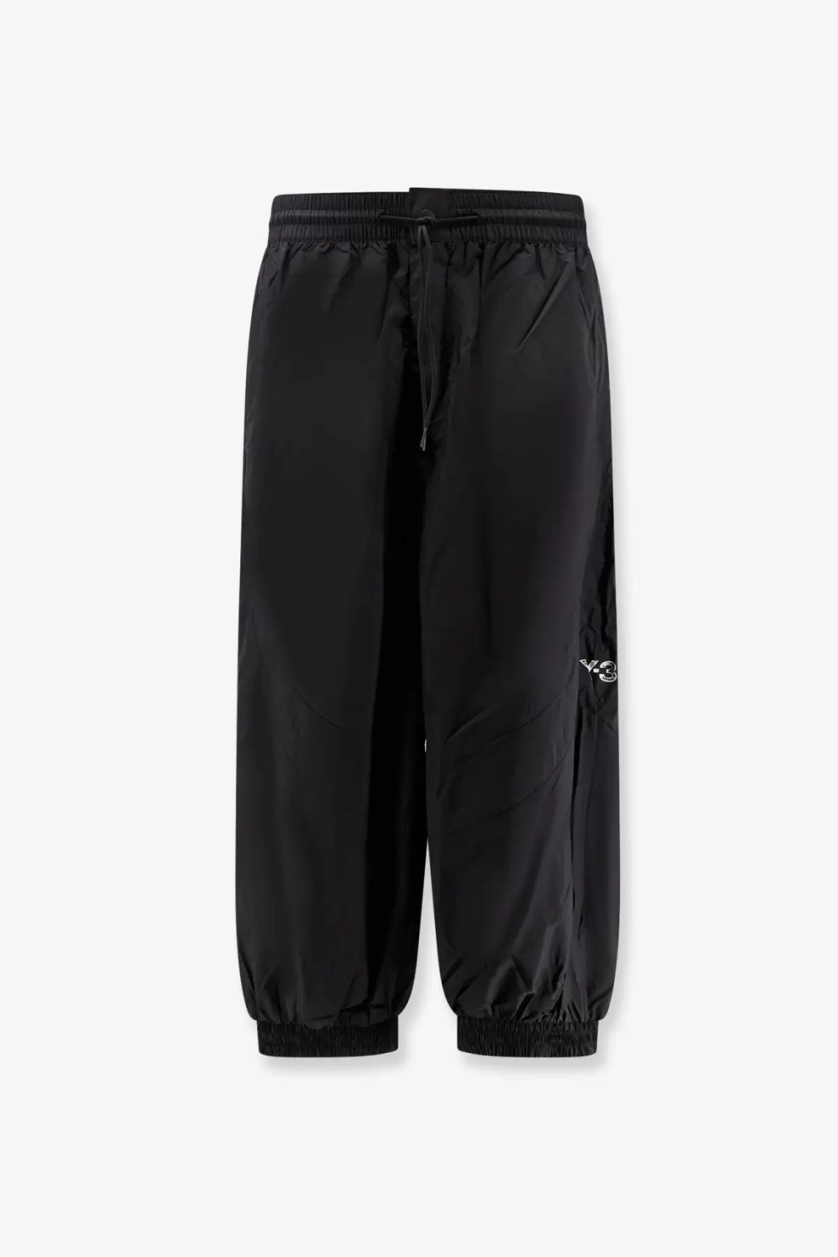 Black y-3 men’s baggy nylon track pants with drawstring waist and elastic cuffs for casual wear