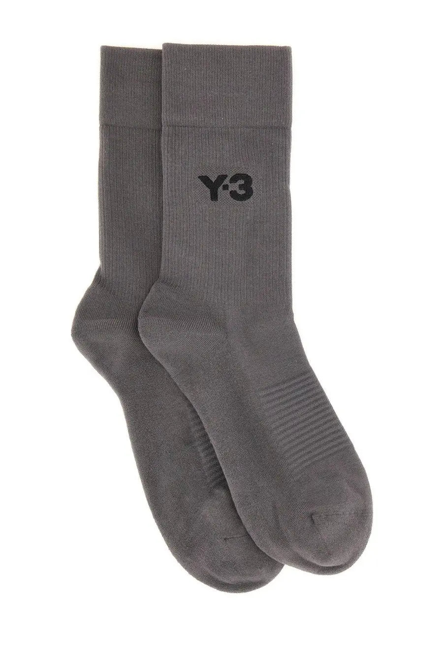 A pair of y-3 men’s classic crew socks in dark gray with ribbed texture and black logo embroidered on the cuff