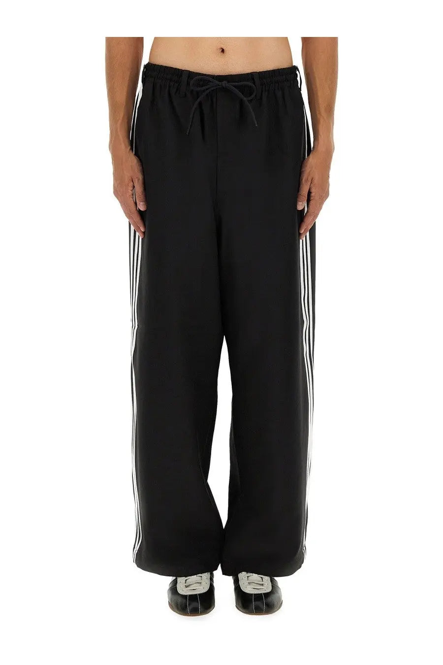 Black adidas y-3 men’s sport uniform stripes track pants with white three stripes and drawstring waistband