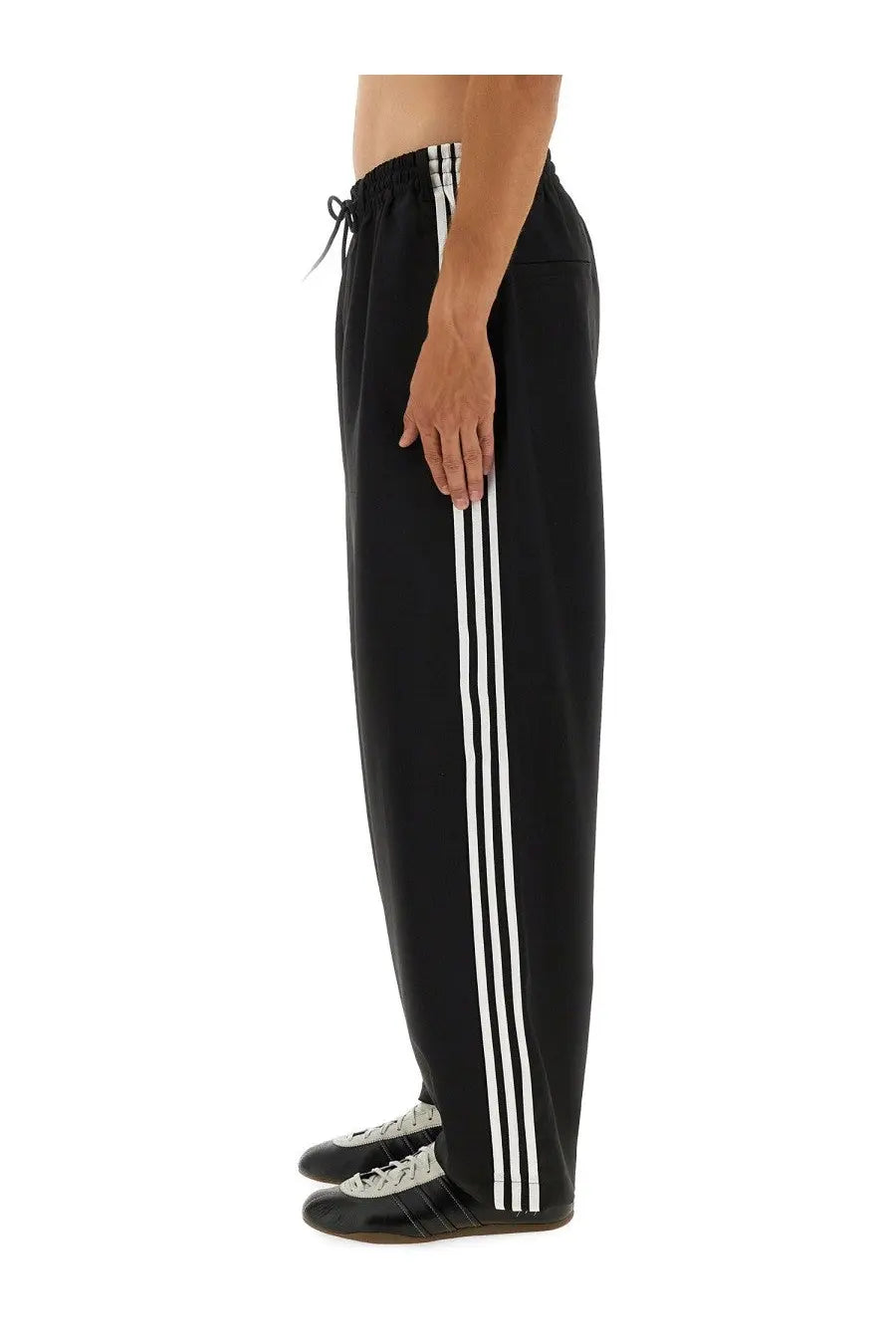 Black adidas y-3 men’s sport uniform stripes pants with three white stripes and drawstring waistband