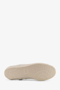 Beige rubber sole with hexagonal tread and embossed logo on y-3 men’s stan smith lo pro leather sneakers white
