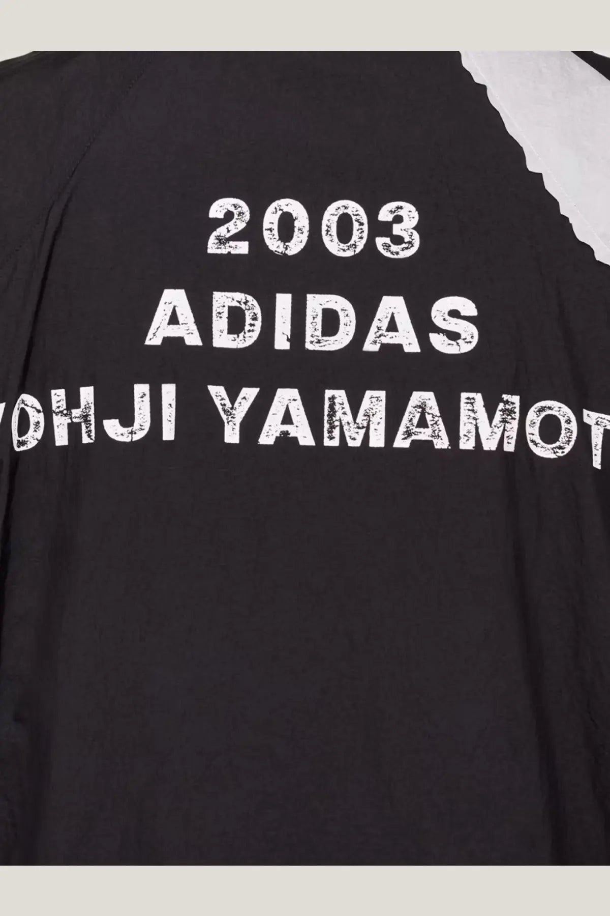 Black adidas x yohji yamamoto y3 men’s water repellent nylon jacket with white distressed lettering and white shoulder panel