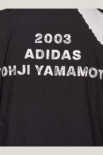 Black adidas x yohji yamamoto y-3 men’s water repellent nylon jacket with white distressed lettering and shoulder panel