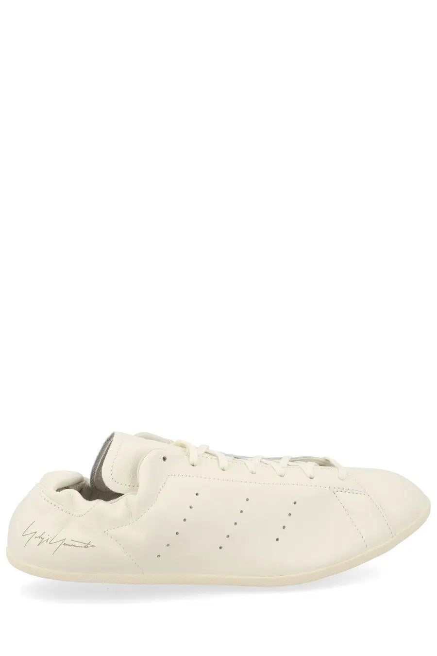 Cream-colored leather Y-3 unisex Stan Smith LO Pro sneaker with subtle perforations and signature logo on the side