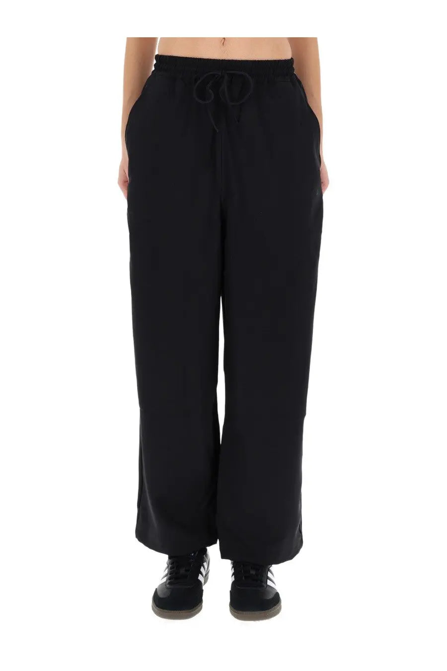 Y-3 women’s black wide-leg jogging pants with drawstring waistband and side pockets for comfortable casual wear