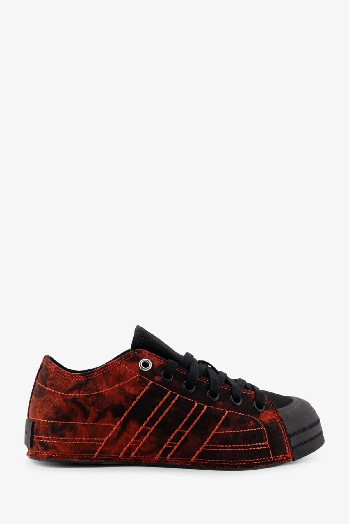 Y-3 women’s nizza lo canvas sneaker in black featuring red and black camouflage pattern and three parallel stripes