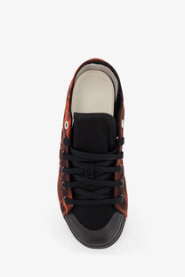 Y-3 women’s Nizza Lo canvas sneakers in black with red and black pattern high-top design and rubber toe cap