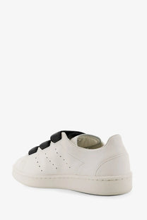 Y-3 women’s stan smith velcro leather sneaker in white with black straps and perforated detailing