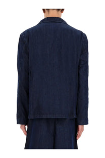 Dark indigo denim jacket with classic collar and subtle stitching details from YMC mens earth scuttlers jacket blue