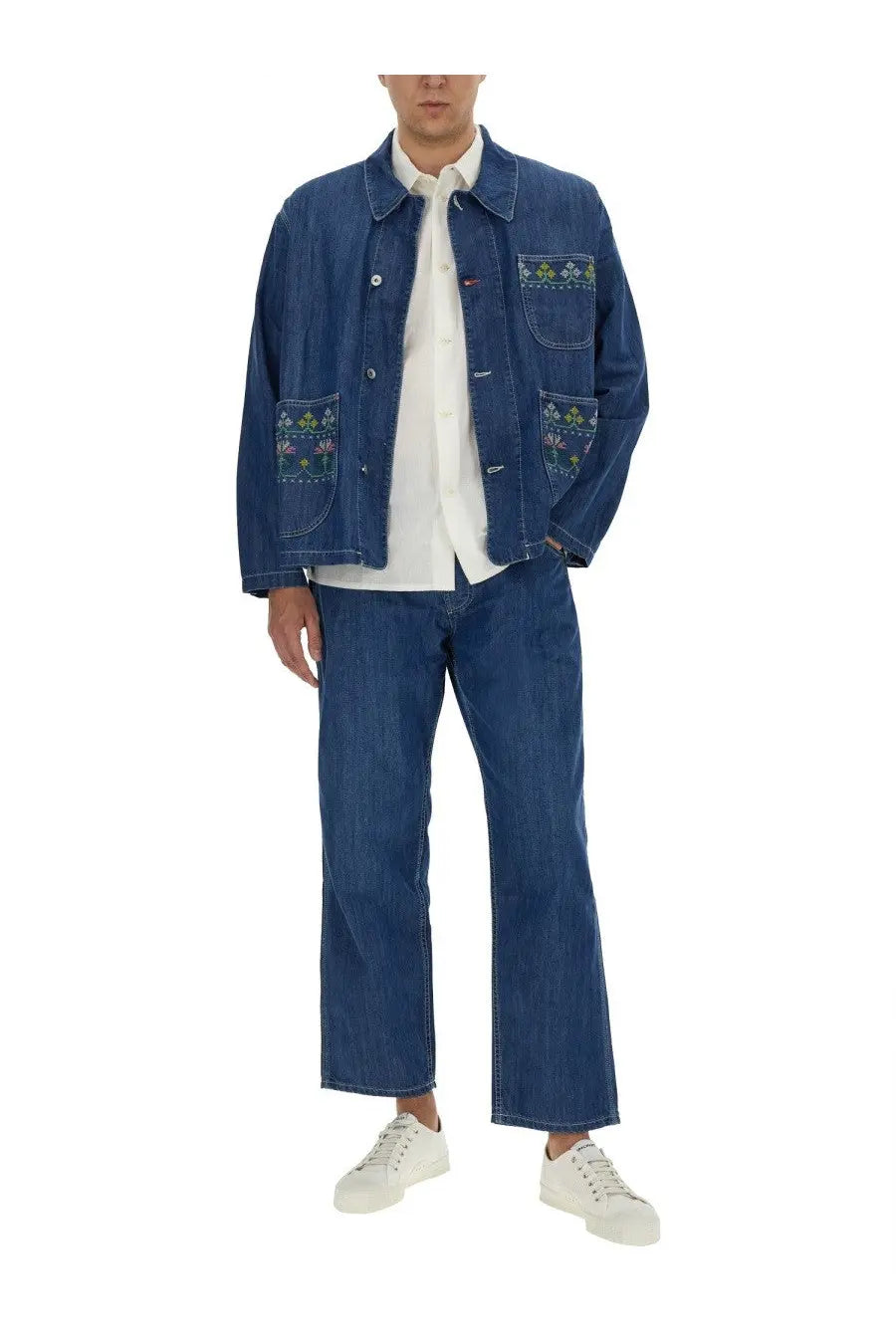 YMC men’s blue denim jacket with floral embroidery on front pockets made from durable jeans fabric