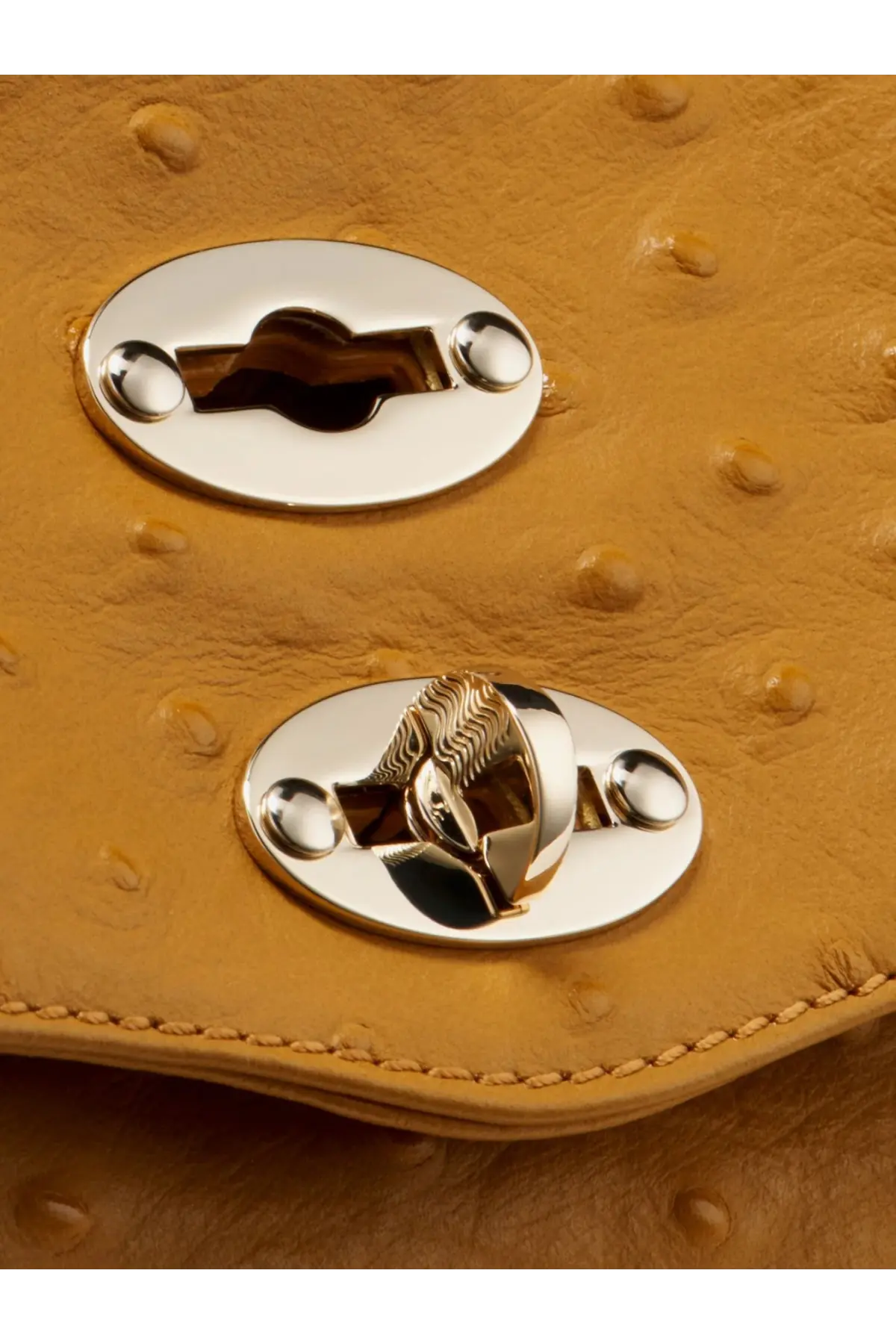 Zanellato women’s postina crossbody brown tan ostrich leather clutch with silver oval clasps and decorative lock
