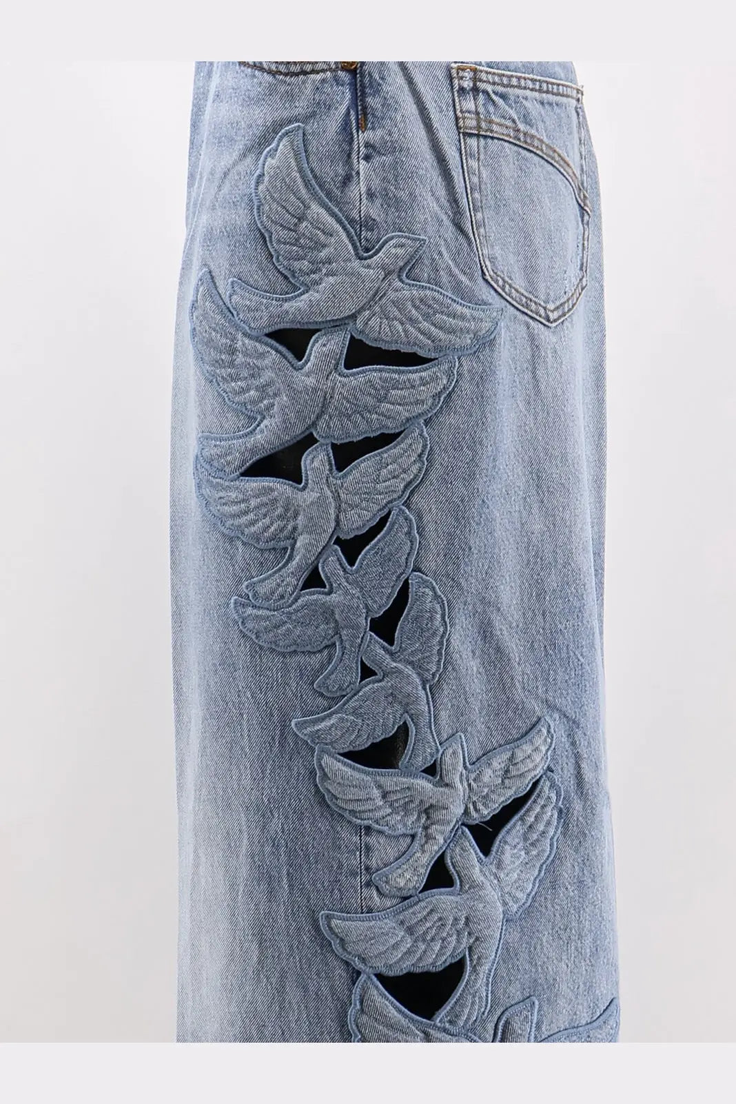 Zimmermann women’s alchemy applique relaxed flare light-wash denim skirt with vertical embroidered dove cut-out detailing