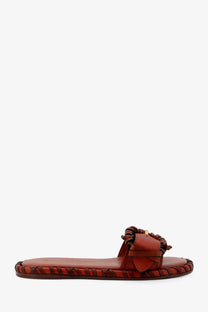 Zimmermann women’s alchemy brown leather slide sandal with braided strap and decorative bow detail