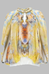 Zimmermann women’s blusa alchemy twist billow yellow flowing long-sleeved blouse with braided neckline and vibrant tie-dye pattern