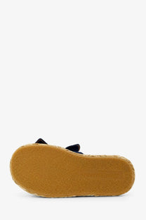 Navy blue Zimmermann women’s carousel espadrille sandal with woven jute sole and small bow detail on strap