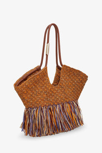 Zimmermann women’s golden time tan woven straw tote bag with brown leather handles and colorful fringe trim