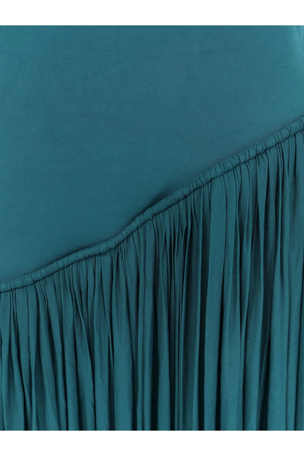 Teal pleated fabric detail with smooth textured surface and stitched edge on zimmermann women’s luna asymmetric jersey dress blue