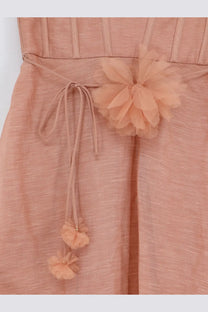 Zimmermann women’s luna silk and linen blend midi dress in peony with textured fabric, vertical pleats, and tulle flower waist embellishment