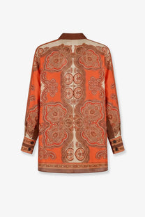 Zimmermann women’s mahon dolman silk shirt in orange with intricate brown and cream paisley pattern