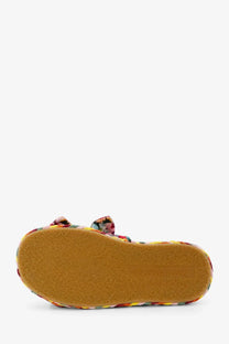 Back view of zimmermann women’s multicolored floral espadrille sandal with woven rubber sole and raffia details