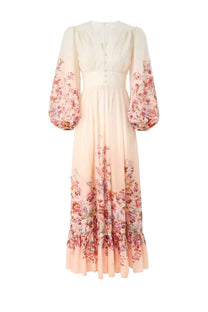 Zimmermann women’s flowing cream-colored maxi dress with long puffed sleeves and soft pink mauve floral pattern