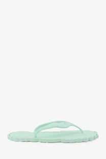 Zimmermann women’s seafoam thong rubber sandal in mint green with scalloped edges and a sleek simple design