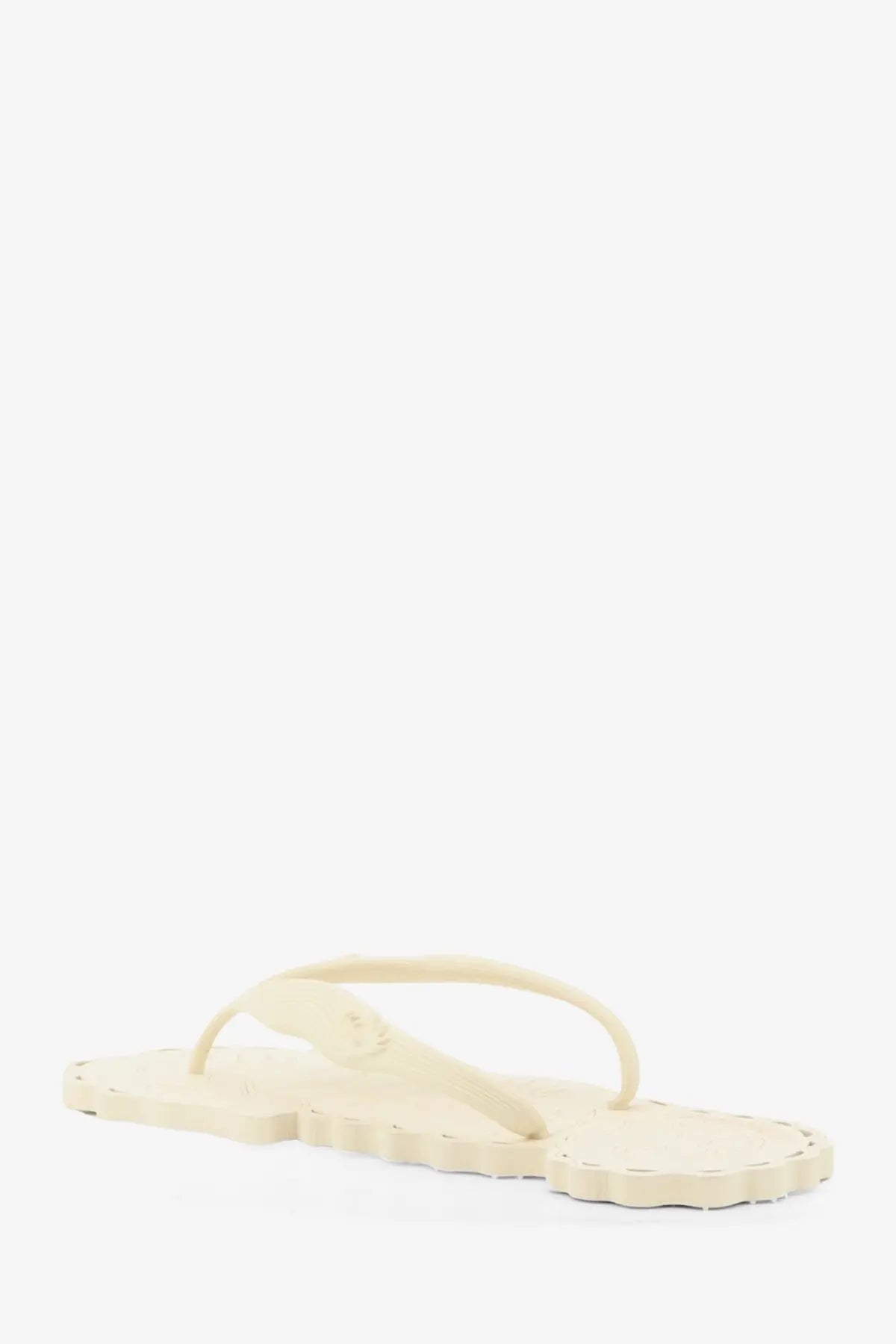 Zimmermann women’s seafoam thong rubber sandal in cream with scalloped edge and simple flip-flop design